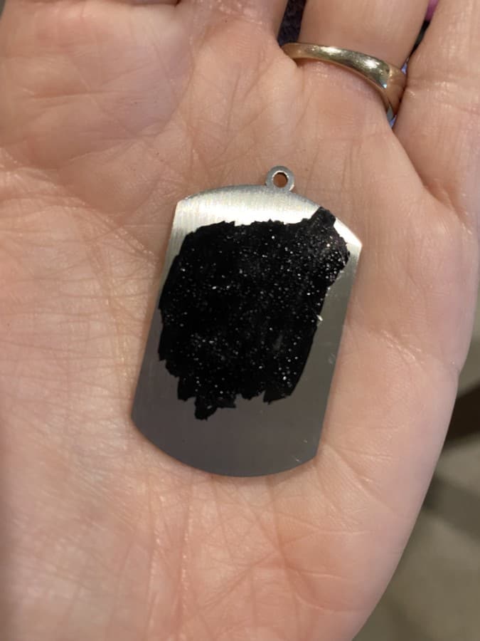 Engraved dog tag with acrylic paint